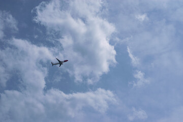 Fototapeta na wymiar Plane taking off, low above the ground.