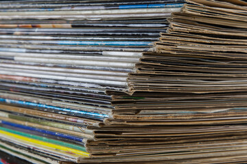 A stack of LP covers from long-playing records. Record covers may be vintage, but they certainly aren't history. A cover you can look at when you put the record on, is the connection to the music..