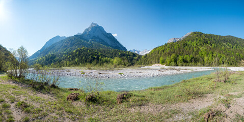 rissbach river in the karwendel alps, spring in the valley. nature conservation area