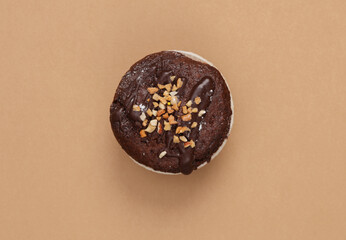 Chocolate Cupcake on brown background. Top view. Flat lay