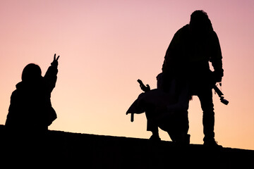 people taking pictures at sunset selfie silhouette valentine's day