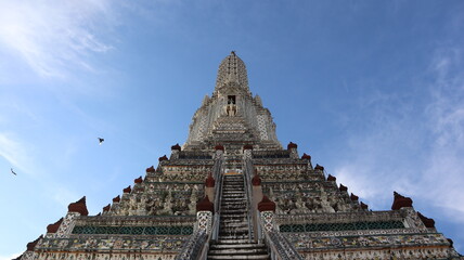 White Buddha pagoda and sky. Wat Arun Ratchawararam Ratchawaramahawihan. Buddha Temple in Thailand.