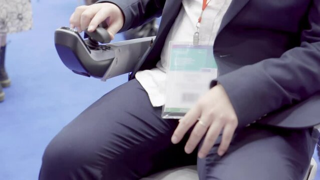 A man in an electric wheelchair.