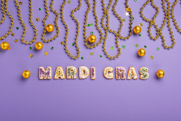 Mardi Gras King Cake Muffins or Cupcakes, Carnival Masks on Purple Background.