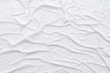 Texture of crumpled wet white paper with folds. writing paper