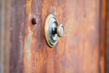 Fototapeta premium Old safe dial on rusted brown vault door