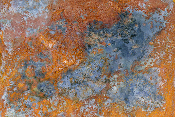 Rusty iron. The texture of the old rusty metal sheet. Closeup.