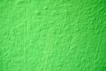 Colored painted wall with stripes. Wall art object with multicolored objects.