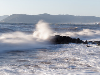 Crashing waves on the beach in massa