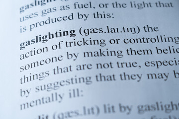 A mock up of a dictionary page with the word gaslighting with selective focussing