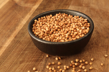 Coriander seeds in a bowl. Dhania seeds