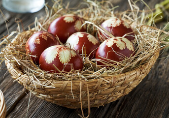 Easter eggs dyed with onion peels in a basket