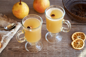 Homemade hot pear drink with fresh pears