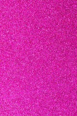Fuchsia shimmer background with reflective glitter material