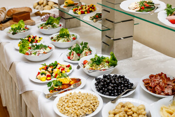 Snacks and canapes are ready for meeting guests at the event. Business conference in a hotel.
