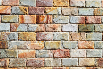 Fototapeta premium Colorful brick wall. Advertising space. Design element. Background. Horizontal.