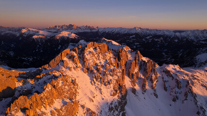 sunrise in the snow dolomites