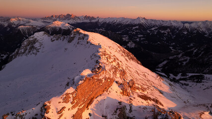 sunrise in the snow dolomites