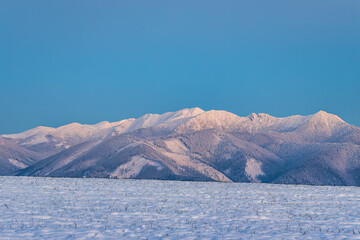 Winter mountain snowy landscape at sunset. The Mala Fatra national park in Slovakia, Europe.