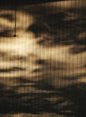 Shadows on a wall in the room