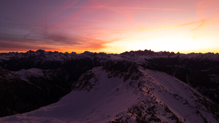 sunrise in the snow dolomites