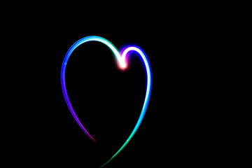 Heart Made with a flashlight, light painting, copy space