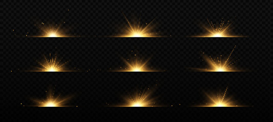 Set of bright golden flashes on black background. Shining star, beautiful golden rays. Optical flare.