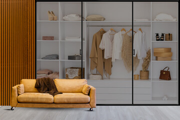 Big wardrobe with different clothes for dressing room. Interior structure of wardrobe body and shelf design