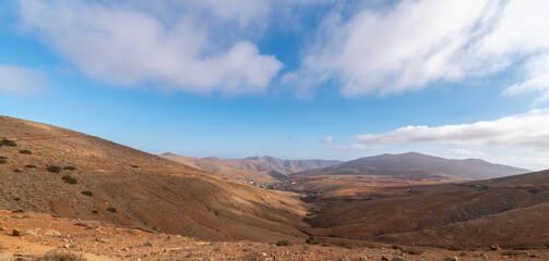 Desert landscape with mountains terraine. Caldera of an ancient volcano.