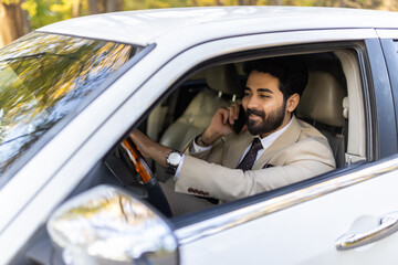 Arab business man talking in the phone while he driving the car, Dangerous arabic traffic accident.