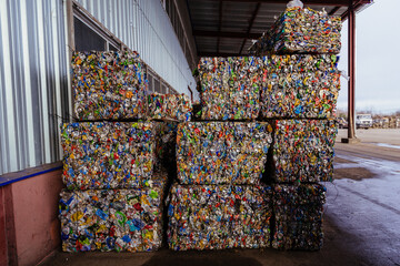 Stacks of garbage. Pressed and packed aluminum cans