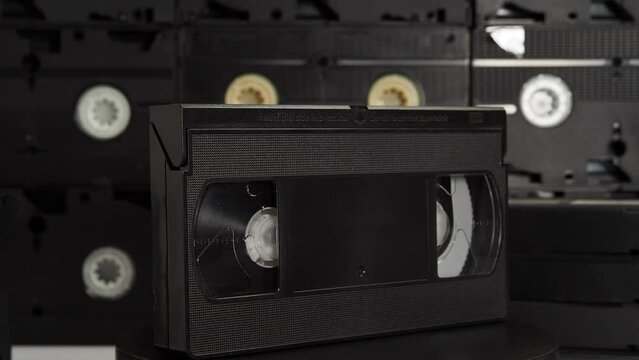 Rotating Old VHS Cassettes. retro video cassettes.