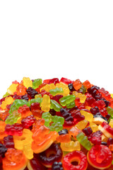Assorted colorful gummy candies. Top view. Jelly donuts. Jelly bears. Isolated on a white background.