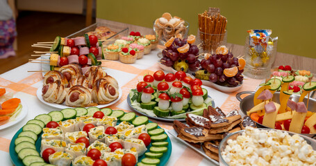 Children's table with festive dishes