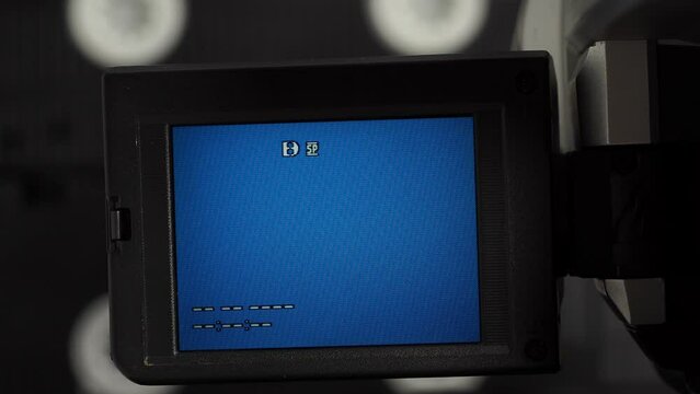 Vintage retro video camera. Outdated old technology, film production.
