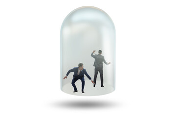Businessman trapped in transparent glass