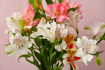 Fototapeta na wymiar Bouquet of fresh alstroemeria flowers on color background. Mother's day celebration