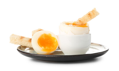 Plate with soft boiled eggs and toasted bread on white background