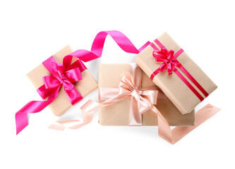 Gift boxes with pink bows for Valentine's Day on white background
