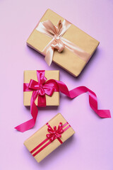 Beautiful gifts for Valentine's Day celebration on lilac background