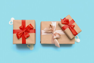 Beautiful gift boxes on color background. Valentine's Day celebration