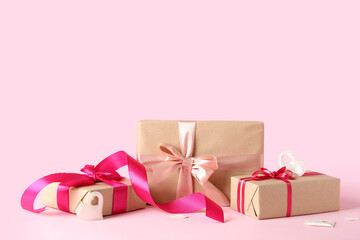 Beautiful gift boxes on pink background. Valentine's Day celebration