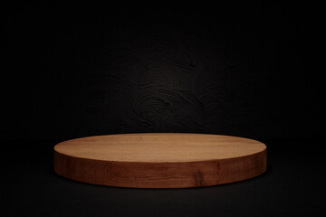Black background, dark stage background and wooden plinth. Mockup.
