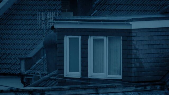 Raining On House Rooftop On Stormy Evening

