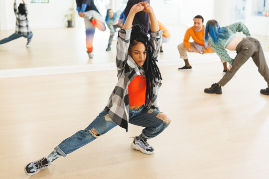 Image of african american female hip hop dancer practicing at dance studio