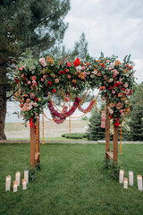 bright colorful wedding arch in mexican style