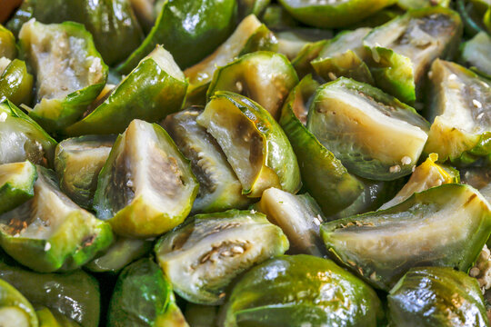 Tray of salad of cooked scarlet eggplant, or jilo