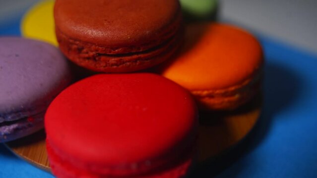 French colorful macarons background close. Colorful French macarons background, Different colorful macaroon background. Rotating.