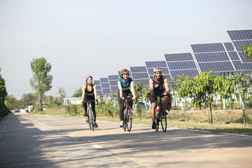 people ride the bike at park