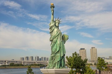 This image shows a replica of the statue of liberty in Tokyo Japan.